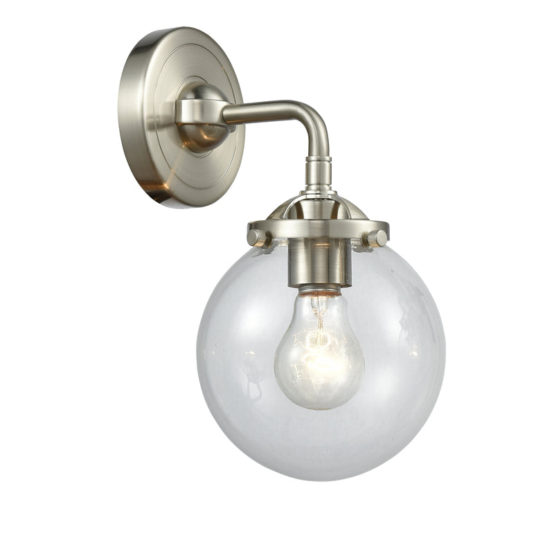 Beacon Sconce shown in the Brushed Satin Nickel finish with a Clear shade