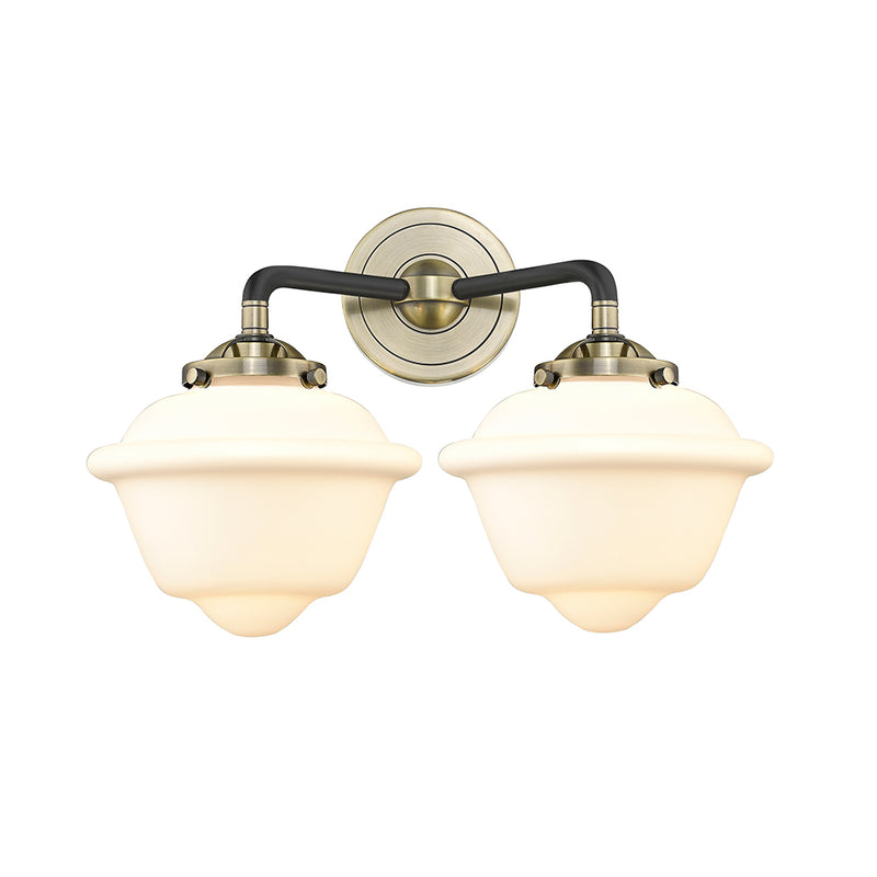 Oxford Bath Vanity Light shown in the Black Antique Brass finish with a Matte White shade