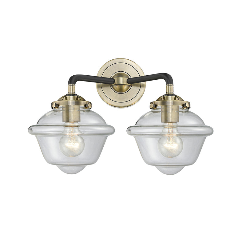 Oxford Bath Vanity Light shown in the Black Antique Brass finish with a Clear shade