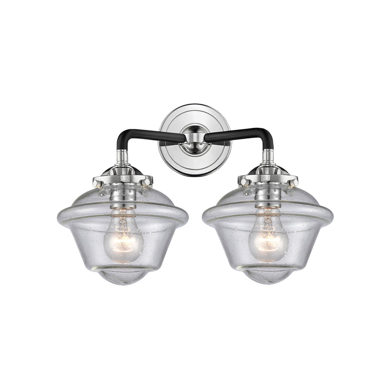 Oxford Bath Vanity Light shown in the Black Polished Nickel finish with a Seedy shade