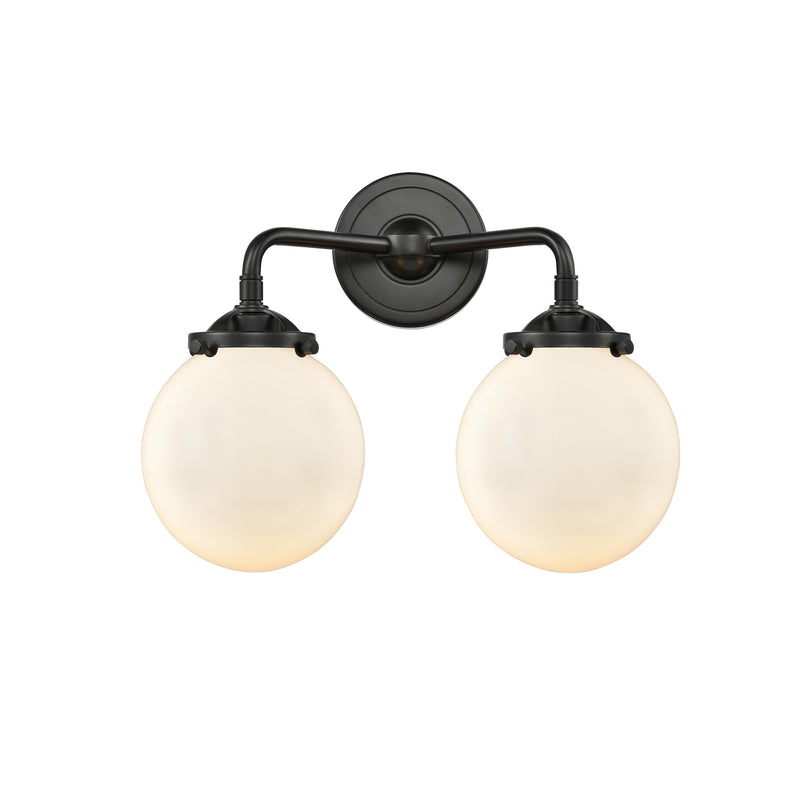 Beacon Bath Vanity Light shown in the Oil Rubbed Bronze finish with a Matte White shade