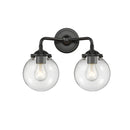 Beacon Bath Vanity Light shown in the Oil Rubbed Bronze finish with a Clear shade