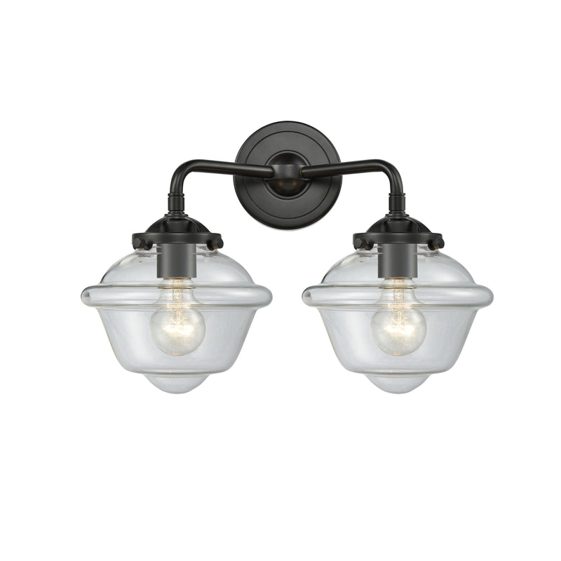 Oxford Bath Vanity Light shown in the Oil Rubbed Bronze finish with a Clear shade