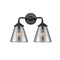 Cone Bath Vanity Light shown in the Oil Rubbed Bronze finish with a Plated Smoke shade