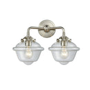 Oxford Bath Vanity Light shown in the Brushed Satin Nickel finish with a Clear shade