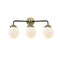 Beacon Bath Vanity Light shown in the Black Antique Brass finish with a Matte White shade