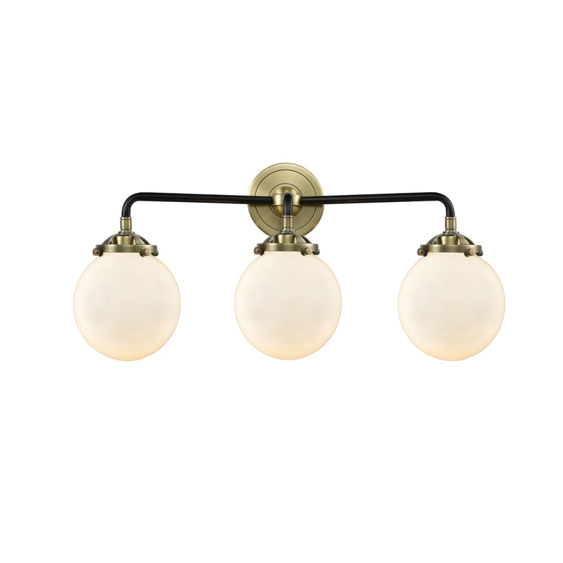 Beacon Bath Vanity Light shown in the Black Antique Brass finish with a Matte White shade