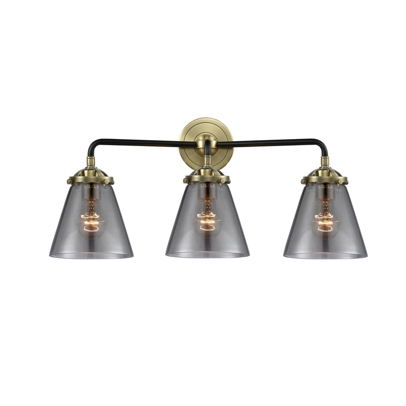 Cone Bath Vanity Light shown in the Black Antique Brass finish with a Plated Smoke shade