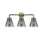 Cone Bath Vanity Light shown in the Black Antique Brass finish with a Plated Smoke shade