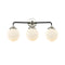 Beacon Bath Vanity Light shown in the Black Polished Nickel finish with a Matte White shade