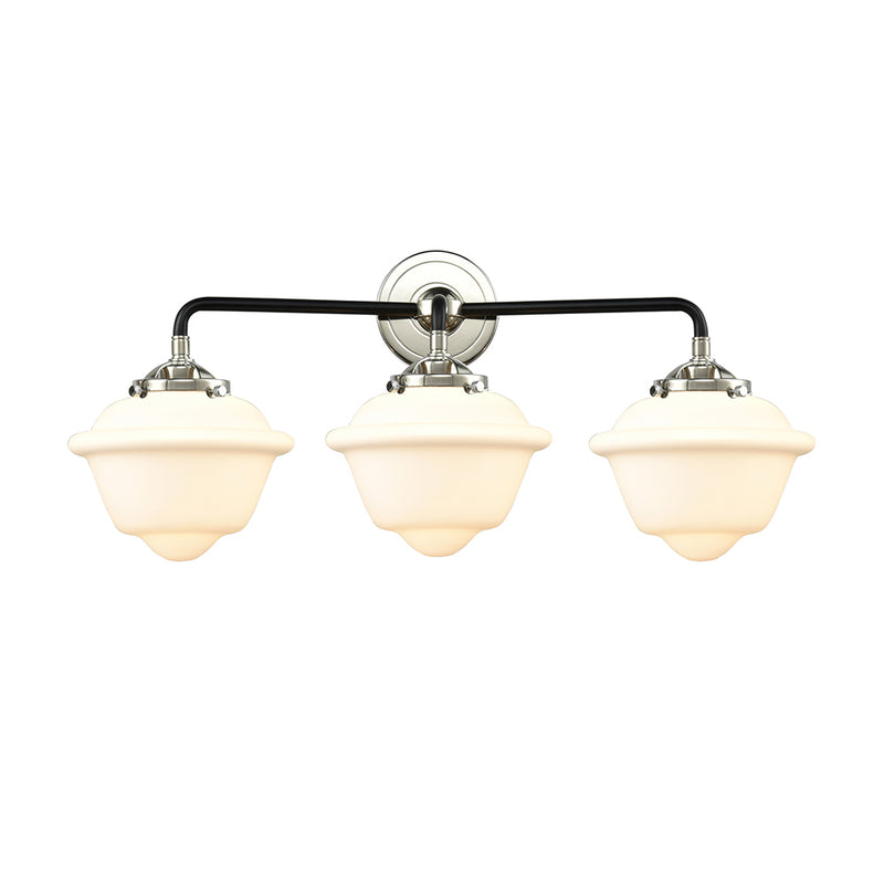 Oxford Bath Vanity Light shown in the Black Polished Nickel finish with a Matte White shade