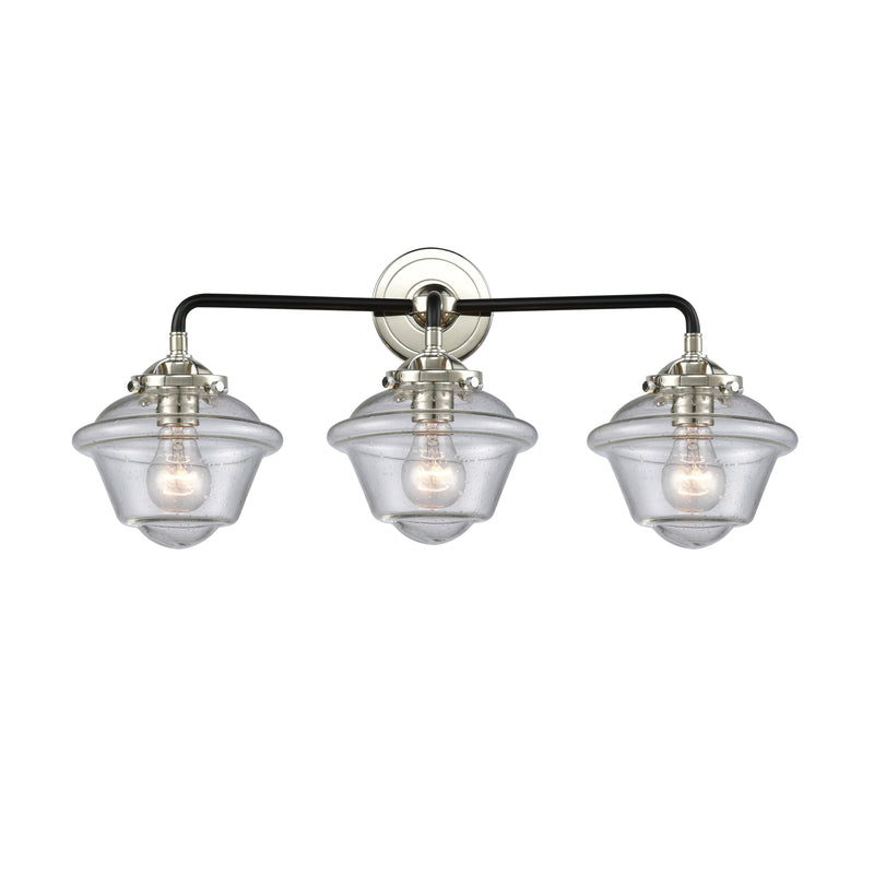 Oxford Bath Vanity Light shown in the Black Polished Nickel finish with a Seedy shade