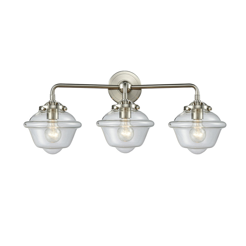 Oxford Bath Vanity Light shown in the Brushed Satin Nickel finish with a Clear shade