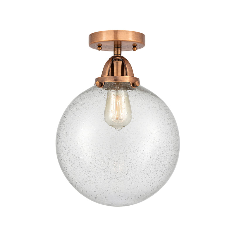 Beacon Semi-Flush Mount shown in the Antique Copper finish with a Seedy shade