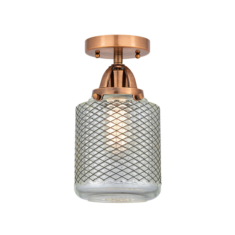 Stanton Semi-Flush Mount shown in the Antique Copper finish with a Clear Wire Mesh shade