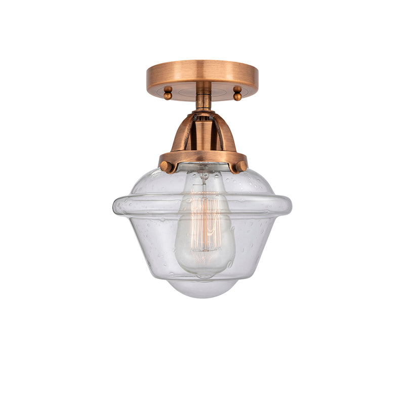 Oxford Semi-Flush Mount shown in the Antique Copper finish with a Seedy shade