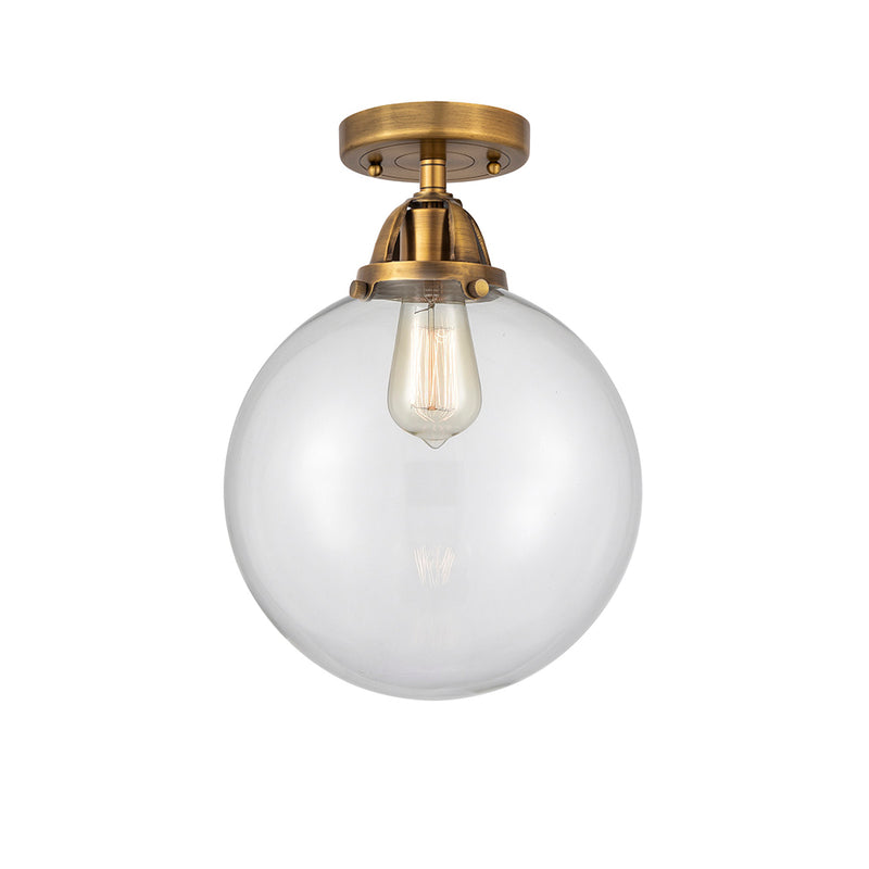 Beacon Semi-Flush Mount shown in the Brushed Brass finish with a Clear shade