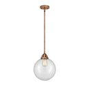 Beacon Mini Pendant shown in the Antique Copper finish with a Clear shade