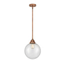 Beacon Mini Pendant shown in the Antique Copper finish with a Seedy shade