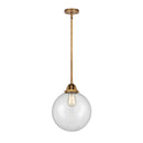 Beacon Mini Pendant shown in the Brushed Brass finish with a Clear shade