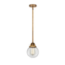 Beacon Mini Pendant shown in the Brushed Brass finish with a Clear shade