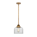 Bell Mini Pendant shown in the Brushed Brass finish with a Clear shade