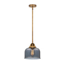 Bell Mini Pendant shown in the Brushed Brass finish with a Plated Smoke shade