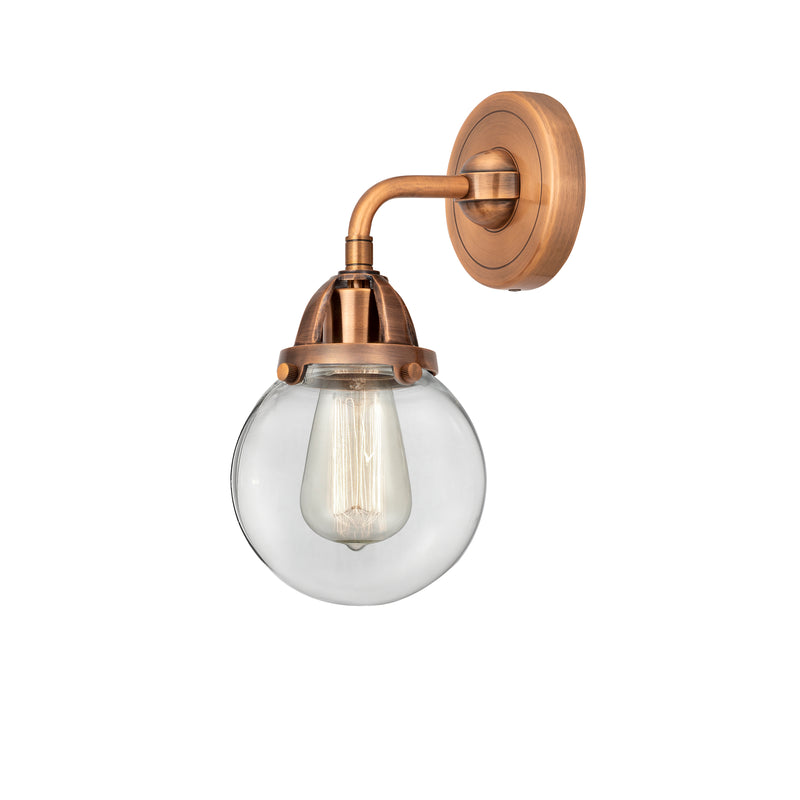 Beacon Sconce shown in the Antique Copper finish with a Clear shade