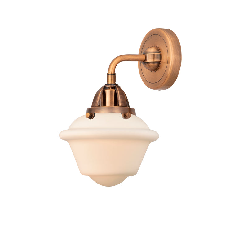 Oxford Sconce shown in the Antique Copper finish with a Matte White shade