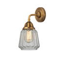 Chatham Sconce shown in the Brushed Brass finish with a Clear shade