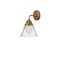 Cone Sconce shown in the Brushed Brass finish with a Clear shade