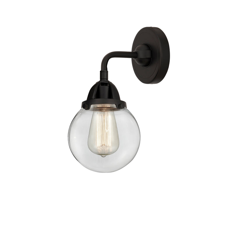 Beacon Sconce shown in the Matte Black finish with a Clear shade