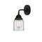 Bell Sconce shown in the Matte Black finish with a Clear shade