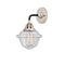 Oxford Sconce shown in the Black Polished Nickel finish with a Seedy shade