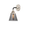 Cone Sconce shown in the Black Polished Nickel finish with a Plated Smoke shade