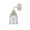 Canton Sconce shown in the Polished Nickel finish with a Seedy shade