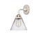 Cone Sconce shown in the Polished Nickel finish with a Clear shade