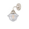 Oxford Sconce shown in the Polished Nickel finish with a Seedy shade