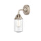 Dover Sconce shown in the Brushed Satin Nickel finish with a Seedy shade