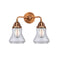 Bellmont Bath Vanity Light shown in the Antique Copper finish with a Clear shade