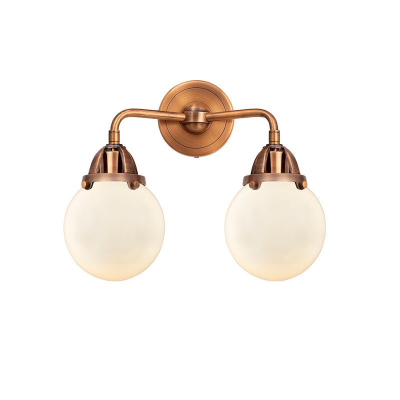 Beacon Bath Vanity Light shown in the Antique Copper finish with a Matte White shade