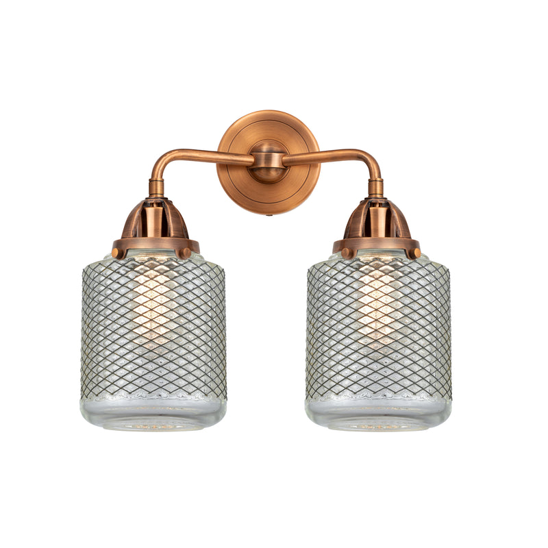 Stanton Bath Vanity Light shown in the Antique Copper finish with a Clear Wire Mesh shade