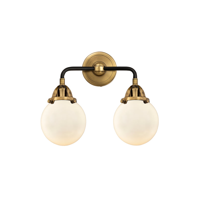 Beacon Bath Vanity Light shown in the Black Antique Brass finish with a Matte White shade