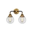 Beacon Bath Vanity Light shown in the Black Antique Brass finish with a Clear shade