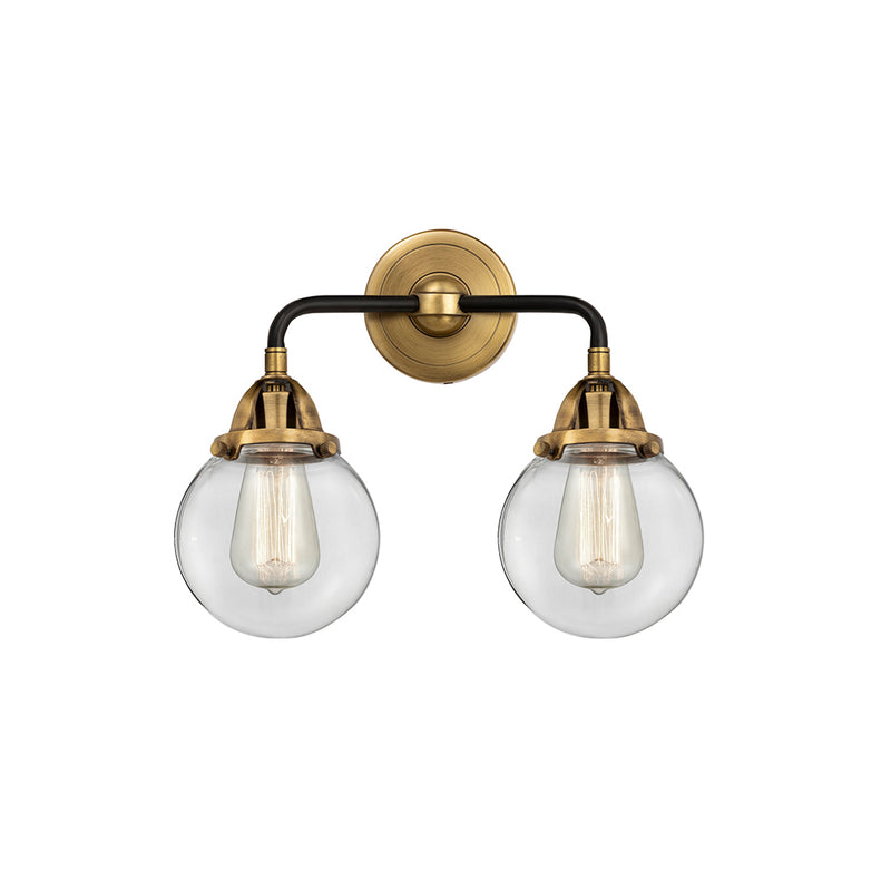 Beacon Bath Vanity Light shown in the Black Antique Brass finish with a Clear shade