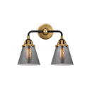 Cone Bath Vanity Light shown in the Black Antique Brass finish with a Plated Smoke shade