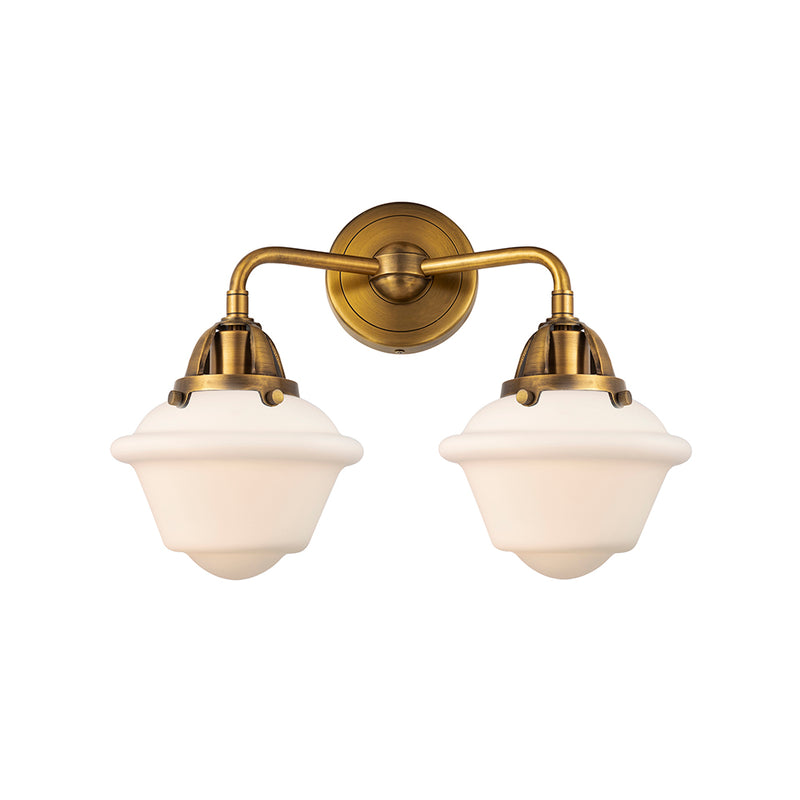 Oxford Bath Vanity Light shown in the Brushed Brass finish with a Matte White shade