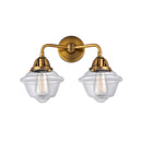 Oxford Bath Vanity Light shown in the Brushed Brass finish with a Clear shade