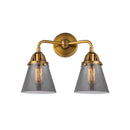 Cone Bath Vanity Light shown in the Brushed Brass finish with a Plated Smoke shade