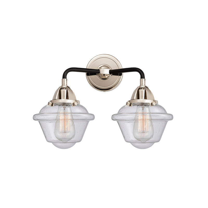 Oxford Bath Vanity Light shown in the Black Polished Nickel finish with a Seedy shade